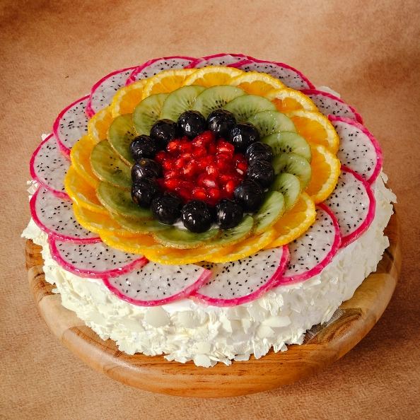 white forest fruit garnish cake